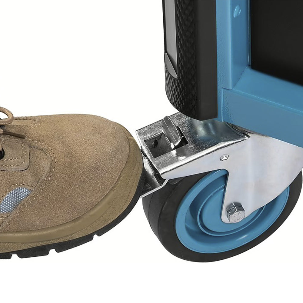 Swivel castor with brake on the HAZET tool trolley being locked with a work boot.