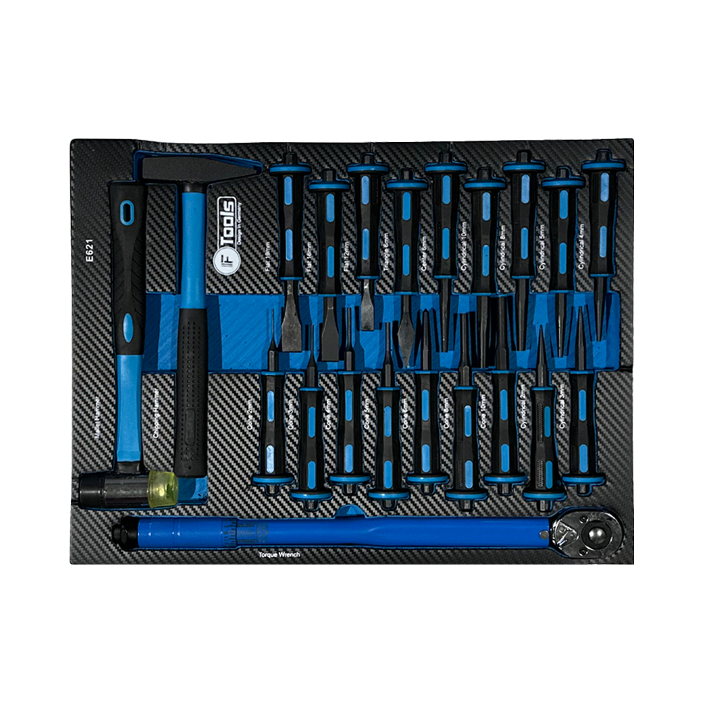 Professional tool cabinet tray with an FTools torque wrench mechanic hammers and a large set of multi-profile punches and chisels.