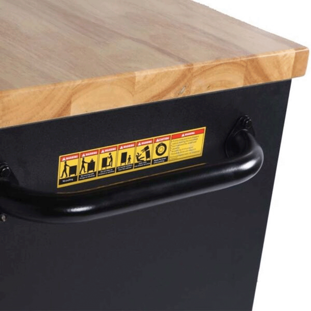 Jungwille Hockenheim tool cabinet detail showing the black steel side handle beneath the solid wood worktop.