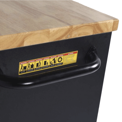 Jungwille Nurburgring tool cabinet close-up showing the tubular black steel side handle bolted beneath the wood worktop.
