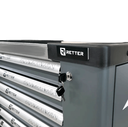 Retter R11 tool cabinet detail focusing on the central key lock mechanism mounted on the grey steel body.