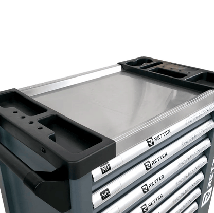 Retter R11 tool cabinet top view showing the smooth stainless steel INOX worktop surface with integrated plastic organizer compartments.